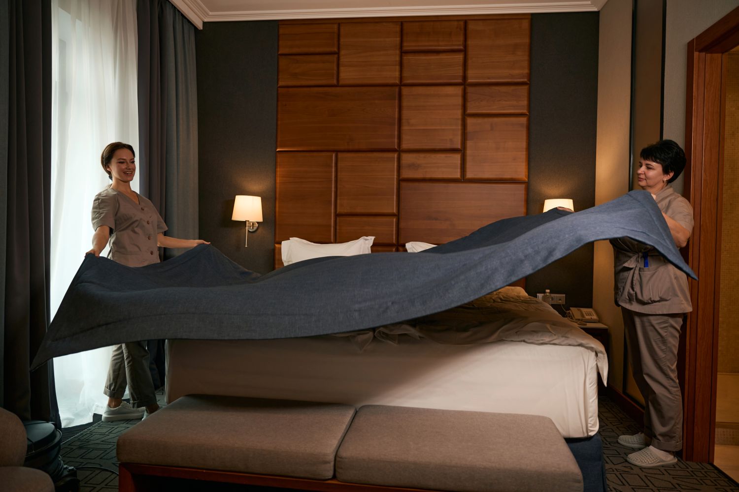 hotel maids making bed